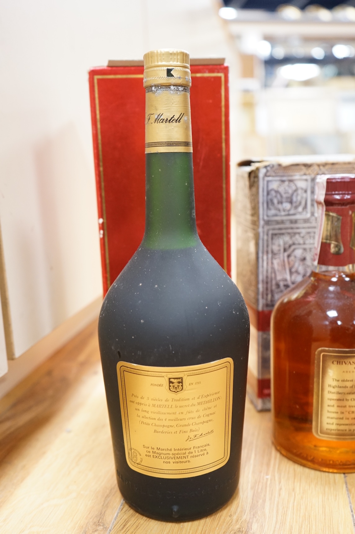 A bottle of Glenmorangie Scotch whisky and five other cased spirits